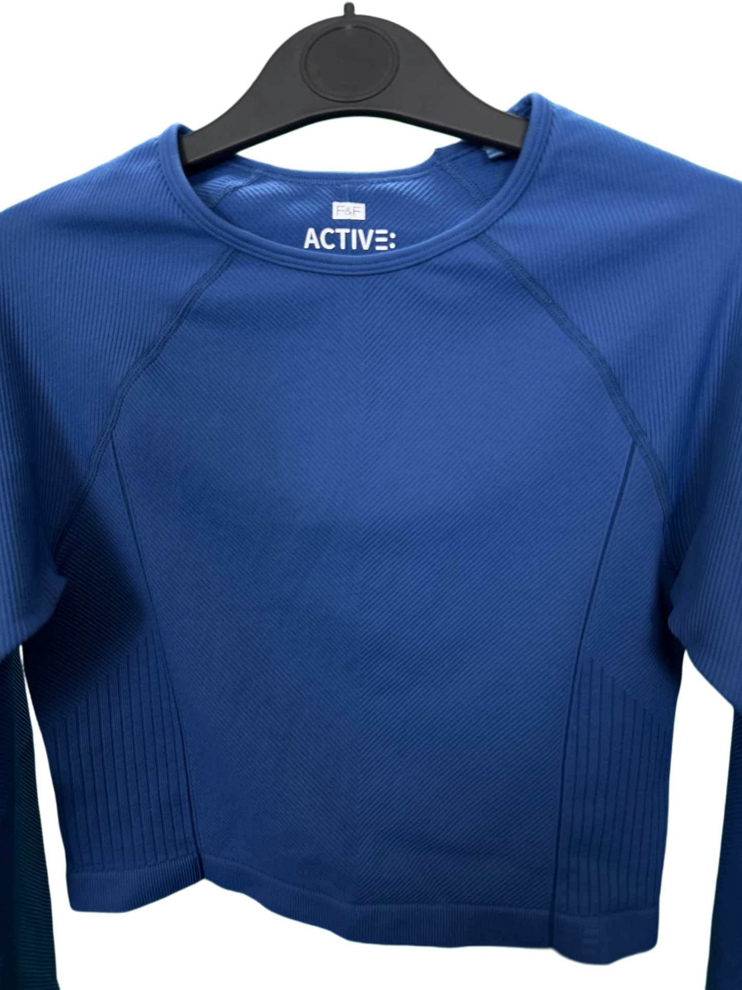 Woman's Active long sleeved ribbed sports top with thumb holes